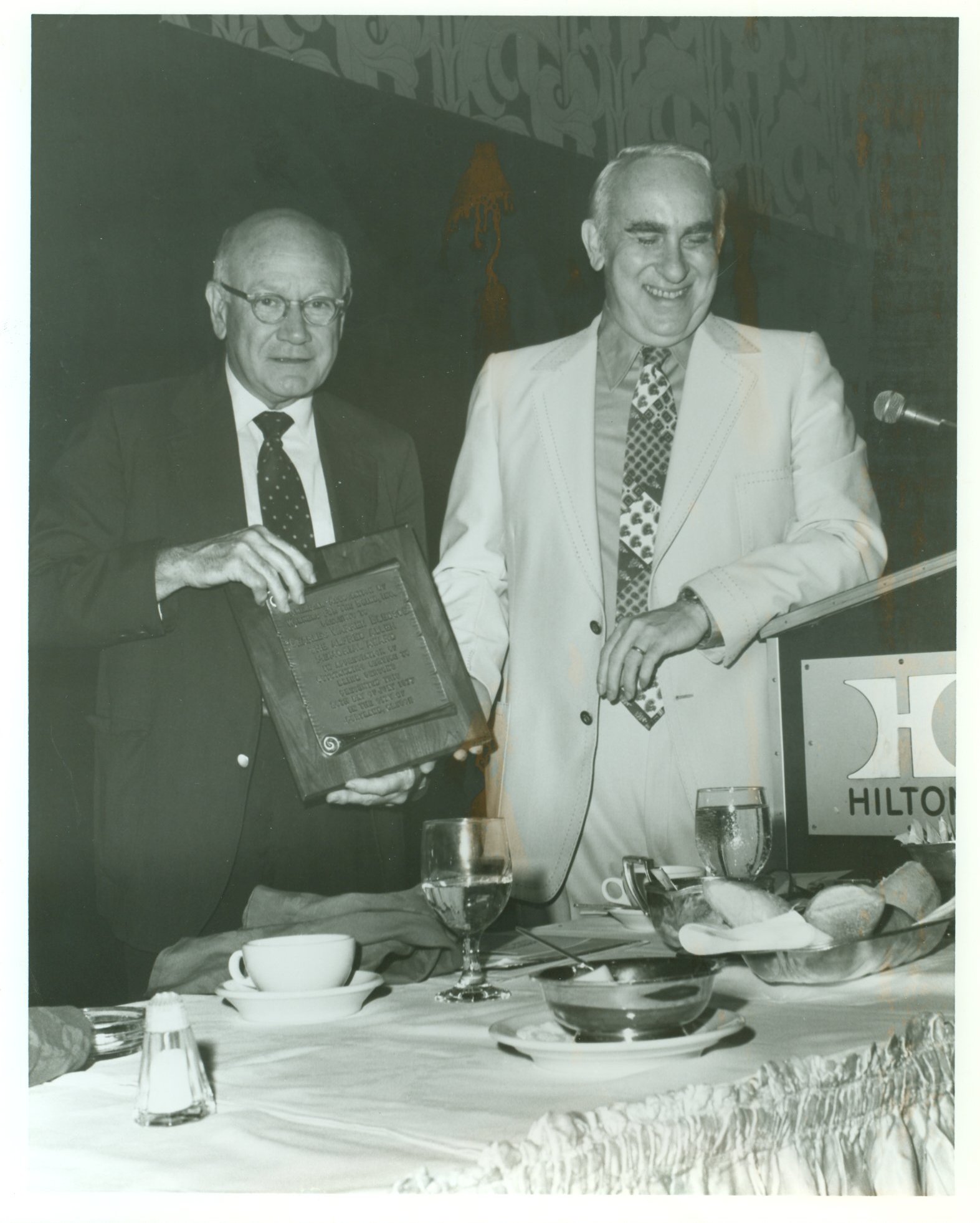 Louis Rives presents Alfred Allen Award to C. Warren Bledsoe, 1977