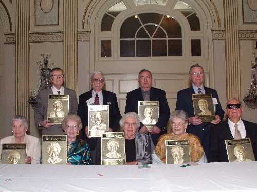 Nine of the ten living legends were able to attend the APH Annual Meeting in 2002. Posing with their plaques are: (back row) Samuel Ashcroft, Cleo Dolan, Louis Vieceli, Stanley Suterko, (front row) Ruth Kaarlela, Natalie Barraga, Eleanor Faye, Alice Raftary, and Donald Wedewer.