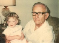 James Max Woolly with granddaughter Laura Woolly (1976)