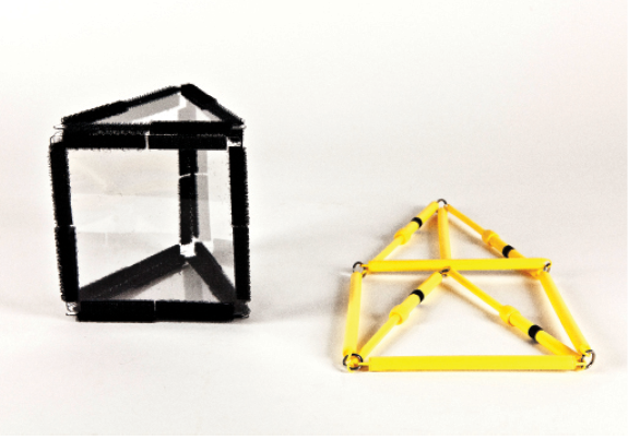 Photo shows a triangular prism constructed from Geometro tiles standing beside the corresponding rod model, which is now in 2-D, in Position 1.