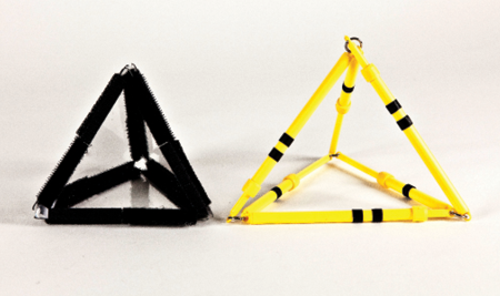 Photo shows a triangular pyramid constructed from Geometro tiles standing beside the corresponding rod model, in Position 1.