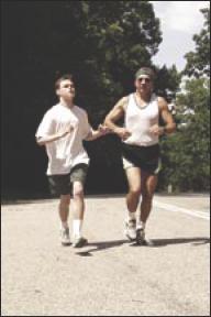Jamie and Dave running in Iroquois Park. Photo submitted by Tristan Pierce.