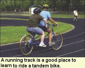 A running track is a good place to learn to ride a tandem bike. Photo submitted by Camp Abilities.