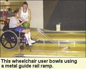 This wheelchair user bowls using a metal guide rail ramp. Photo submitted by Camp Abilities.
