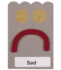 pipe cleaner bent into a frown adhered to the card