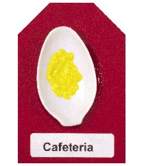 plastic spoon with yellow puff paint or dried beans on the card
