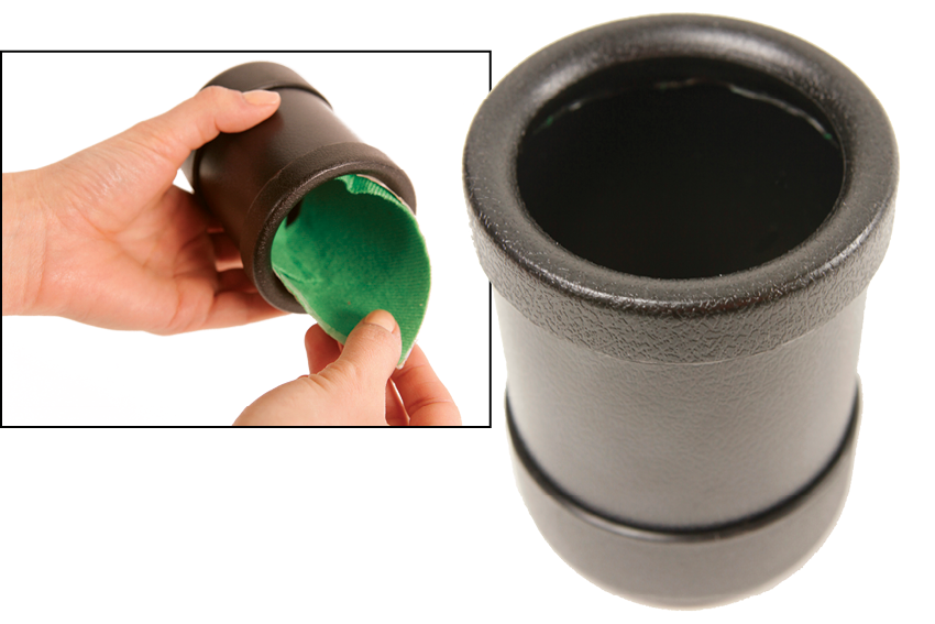 A black plastic cylindrical cup; removal of the green inner lining of the cup is demonstrated.