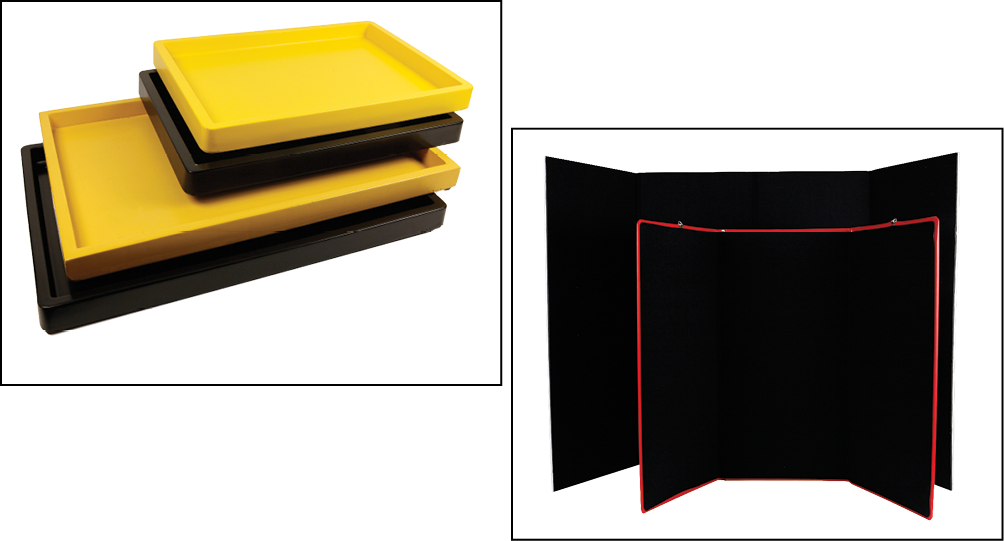 Four Work-Play Trays (one large yellow, one large black, one small yellow, and one small black) and two black felt tri-fold boards.