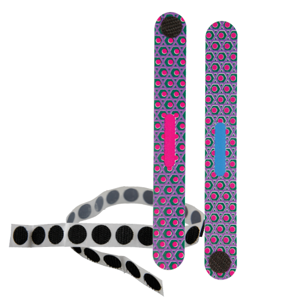 A strip of hook adhesive dots and two Phase III MATCH STICKS, one with a pink stripe and one with a blue stripe; both have a hook adhesive dot attached at one end of the stick.