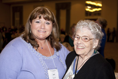 Hall of Fame member Alice Raftary (MI) poses with Jane Thompson, APH's Director of the Accessible Textbook Department, during the Thursday night reception.