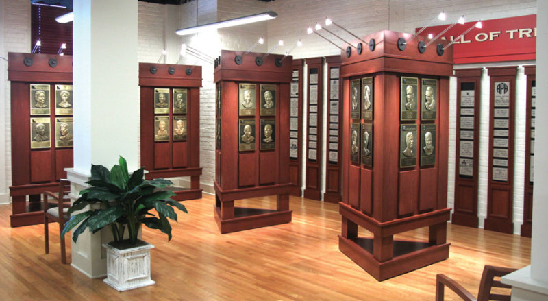 Four triangular kiosks display the plaques of the inductees. Each kiosk has room for 18 plaques