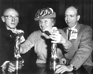 1956, Helen Keller presents the prestigious Albert Lasker Medical Research Award to Drs. Arnall Patz (right) and Everett Kinsey. Kinsey is the biochemist who organized a larger study that confirmed Patz's RLF oxygen findings.