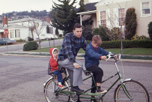 Dean, Ray, and Wes Tuttle on tandem bike, 1970