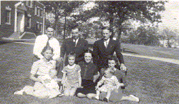 ASB Administrators and families in front of main building (L to R: Beal Kidd and family, Finis Davis and family, James Max Woolly and family (1941)