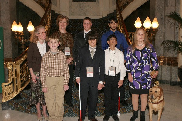 Essay Winners: (Back row, left to right) Doreen Bohm, Josh Pearson, Ibraheem Shahadat; (Front row, left to right) Carla Hayes, Chase Crispin, Alex Follo, Mohamedhadi Somji, and Deborah Kendrick.