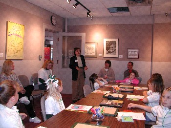 APH's Roberta Williams speaks to Girl Scouts and some family members