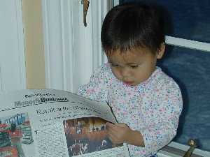 Miss Kyra Anderson (age 2) is helping mom Christine prepare for the New York trip by catching up with The Times.