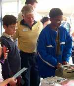 Gary Mudd spent the day at the National Book Festival surrounded by children eager to learn about braille.
