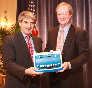 APH President Tuck Tinsley and Perkins President Steven Rothstein holding the new APH Perkins Braillewriter