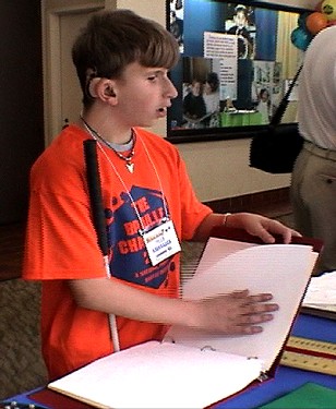 Cover image of the video shows Tyler, one of the four deafblind students featured in the video