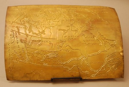 Embossing plate, tactile map
