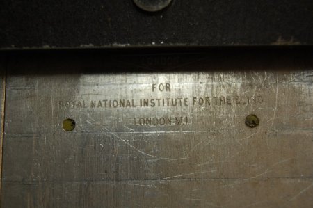 Detail of name plate on board