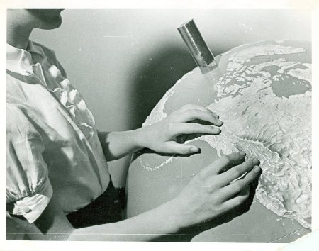 .10 - Girl w/ globe, ca. 1960