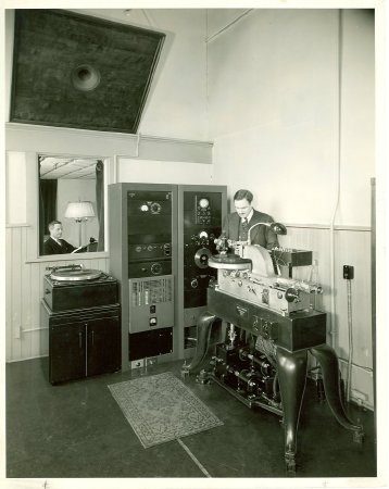 .7 - APH studio, ca. 1936, Earl P. Carter behind record lathe