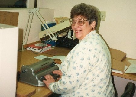 Waunda Cox using a braillewriter, ca. 1985